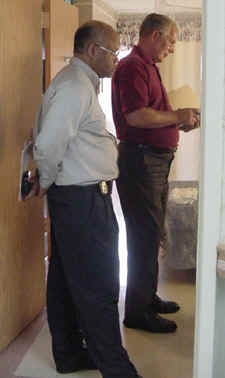 Florida Attorney General Medicaid Fraud Investigators Delroy Thompson (left) and Paul Lester (right) surveying a nursing home in Brevard County.