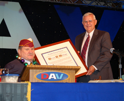 State Attorney Norm Wolfinger with Outstanding Disabled American Veteran award.