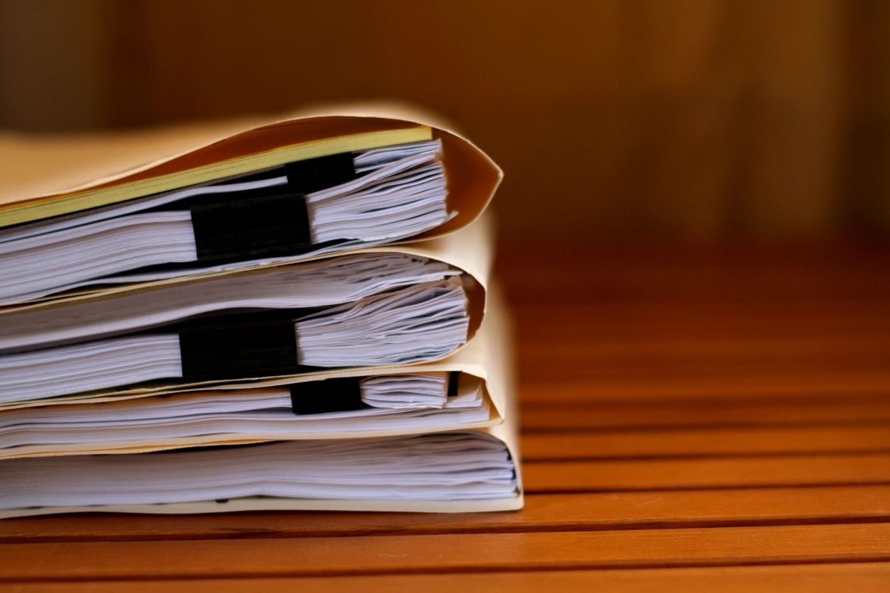 Photo of a stack of paper file folders